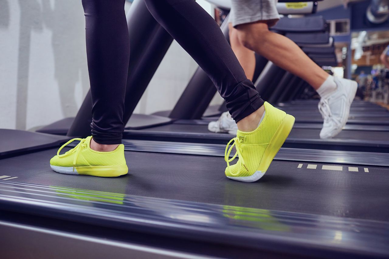 Detail-of-female-legs-on-a-treadmill-in-the-gym